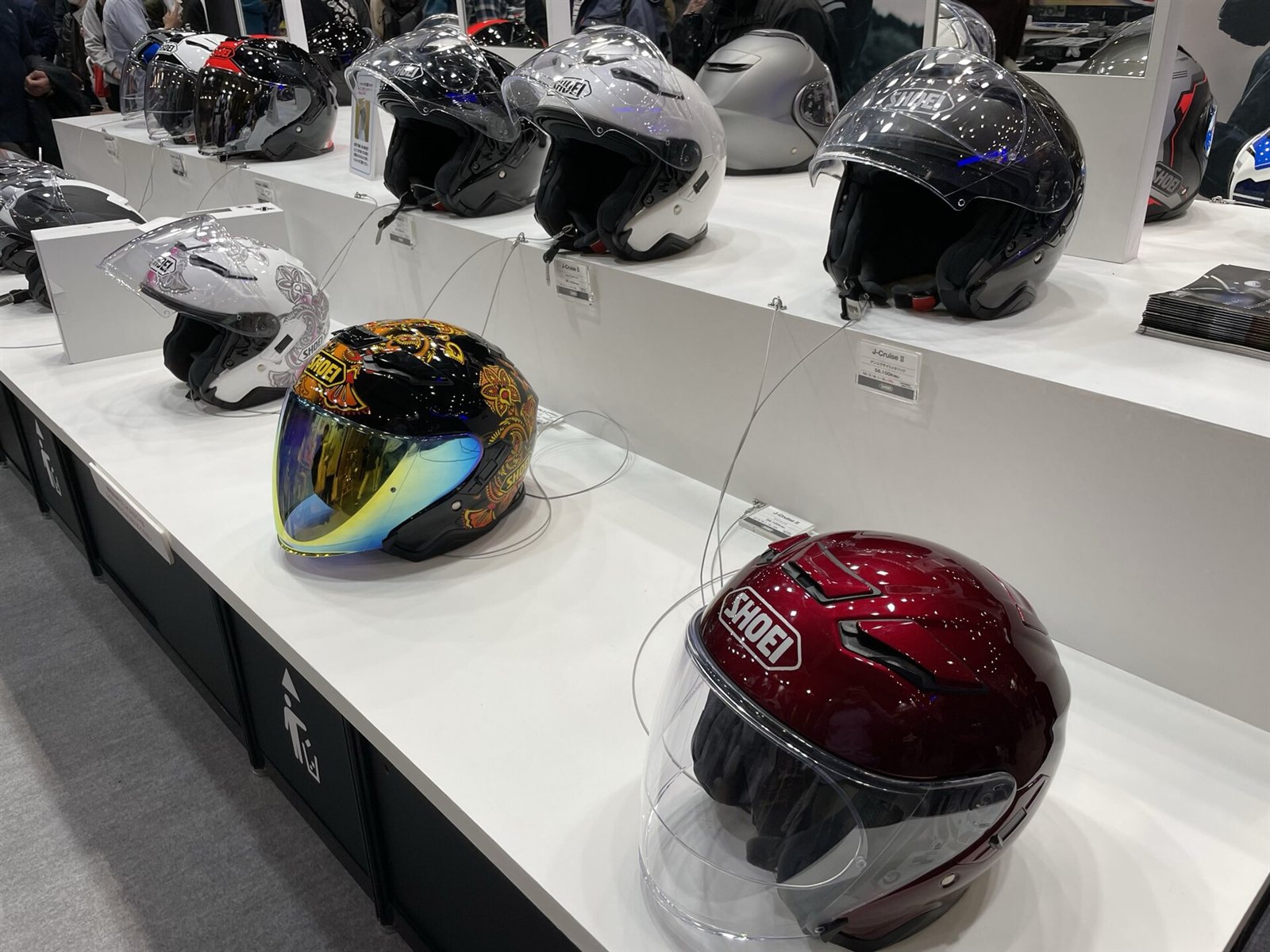 SHOEI premium motorcycle helmets on display